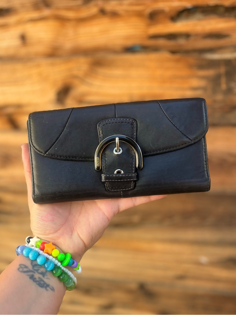 COACH | Black Leather Wallet with Front Buckle Accent